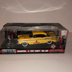 New Jada 1957 Chevrolet Bel Air Taxi Yellow with Deadpool Fie-Cast Figure